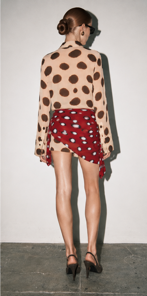 Abstract watercolor print mini dress in cream multi-color, back view showing the silhouette and all-over print