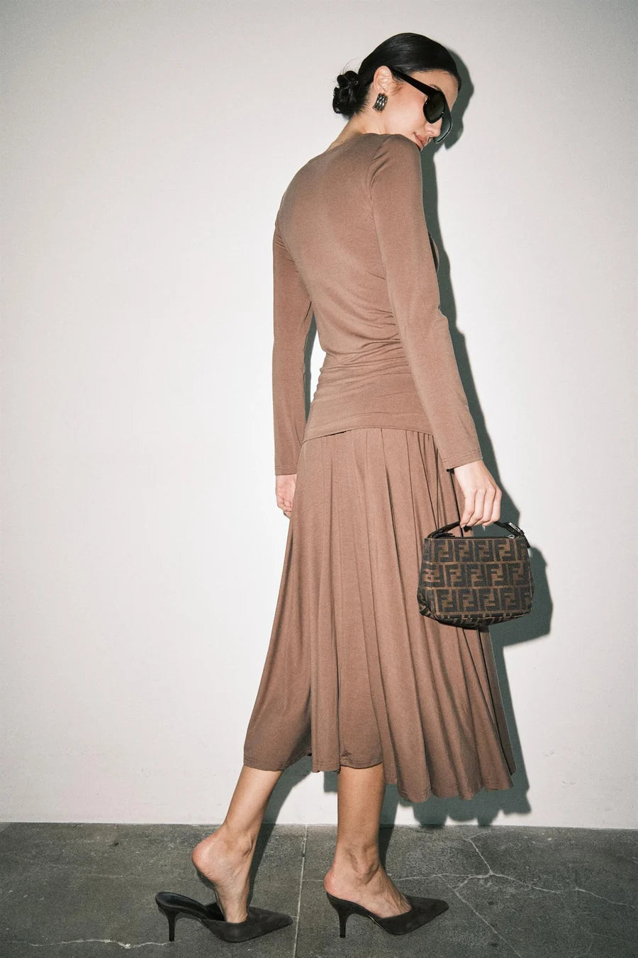 Women's brown ruched long sleeve top with keyhole cutout neckline