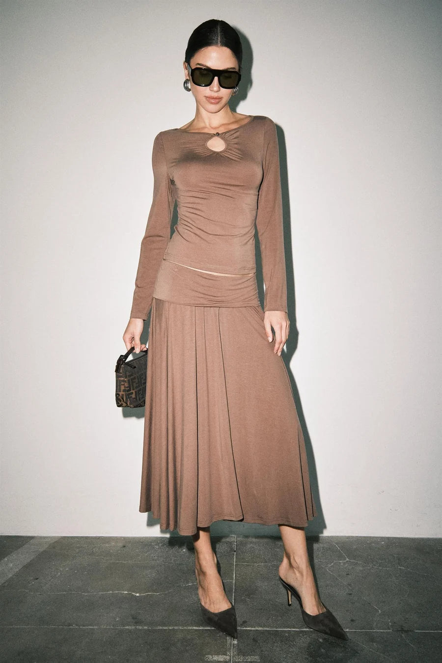 Women's brown ruched long sleeve top with keyhole cutout neckline