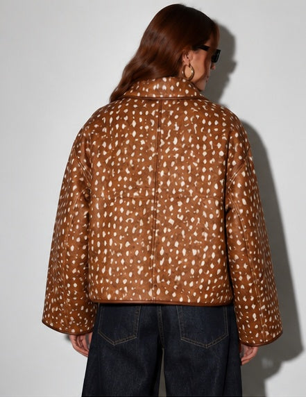 Deer print zip-up jacket in brown and cream, back view showing the relaxed silhouette and all-over spotted print