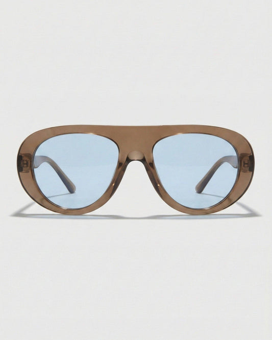 Front view of Oceane polarized aviator sunglasses featuring a bold brown frame, rounded silhouette, and blue-toned lenses.
