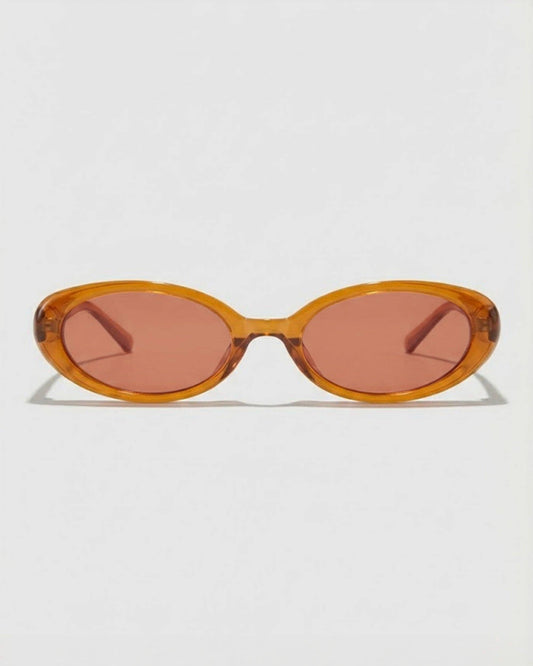 Front view of caramel oval polarized sunglasses featuring a polished warm-toned frame and narrow retro-inspired silhouette.