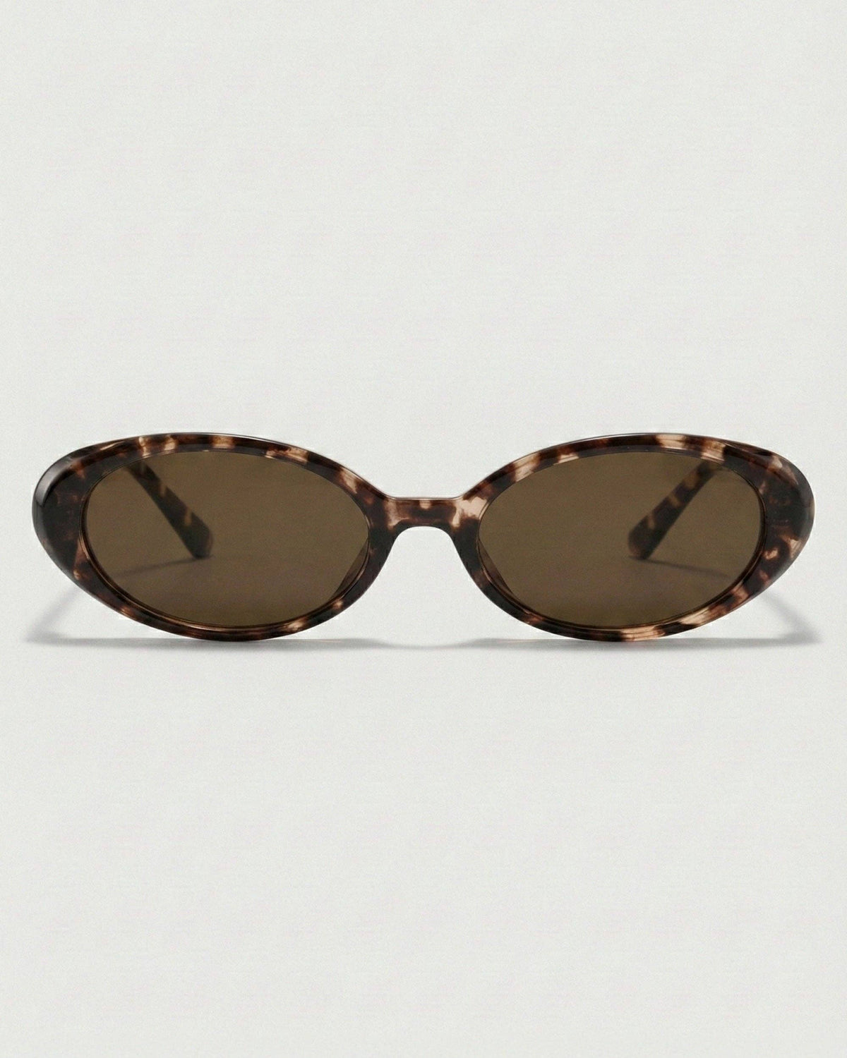 Front view of tortoiseshell oval polarized sunglasses featuring a narrow retro-inspired frame and warm brown lenses.