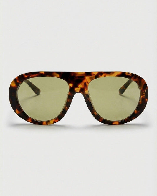 Front view of polarized aviator sunglasses featuring a polished tortoiseshell frame, rounded aviator silhouette, and contrasting green lenses.